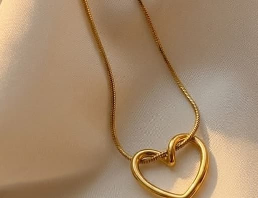 Entwined Open Heart Snake Chain Necklace detail view